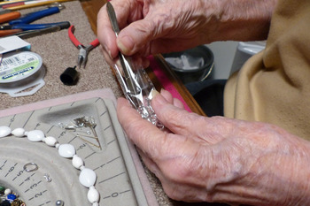 Senior woman working hands edit normal 3 2